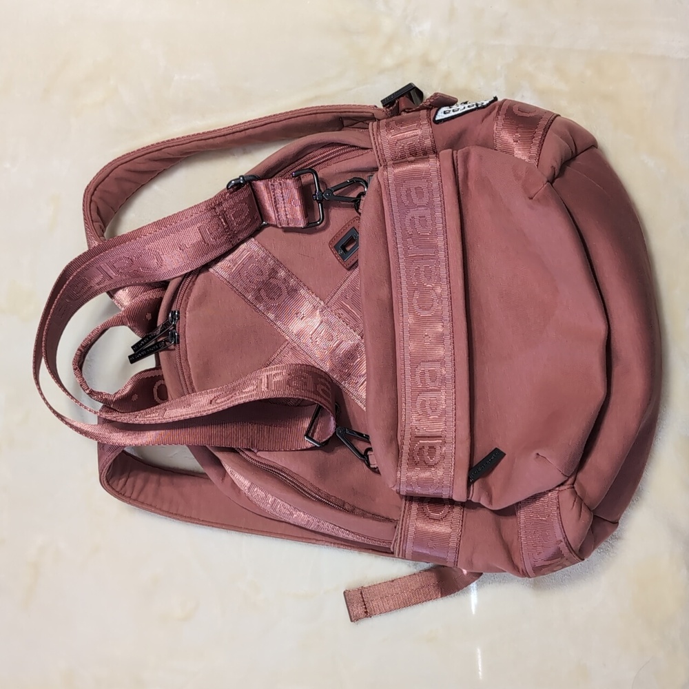 Caraa Athena backpack with a matching crossbody bag that attaches.